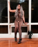 Bailey in horny fishnets teases you with her huge dong 
